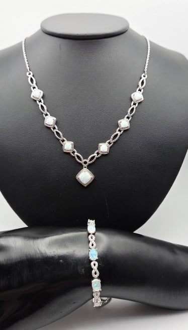 BBJ Sterling Lab Created Opal Set 19.0 Grams: Necklace Measures 18" Necklace Weighs 12.5 Grams Bracelet Measures 6" Bracelet Weighs 6.5 Grams Metal Not Stamped