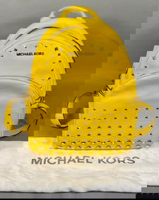 A Michael Kors Yellow 'Erin' Small Studded Backpack