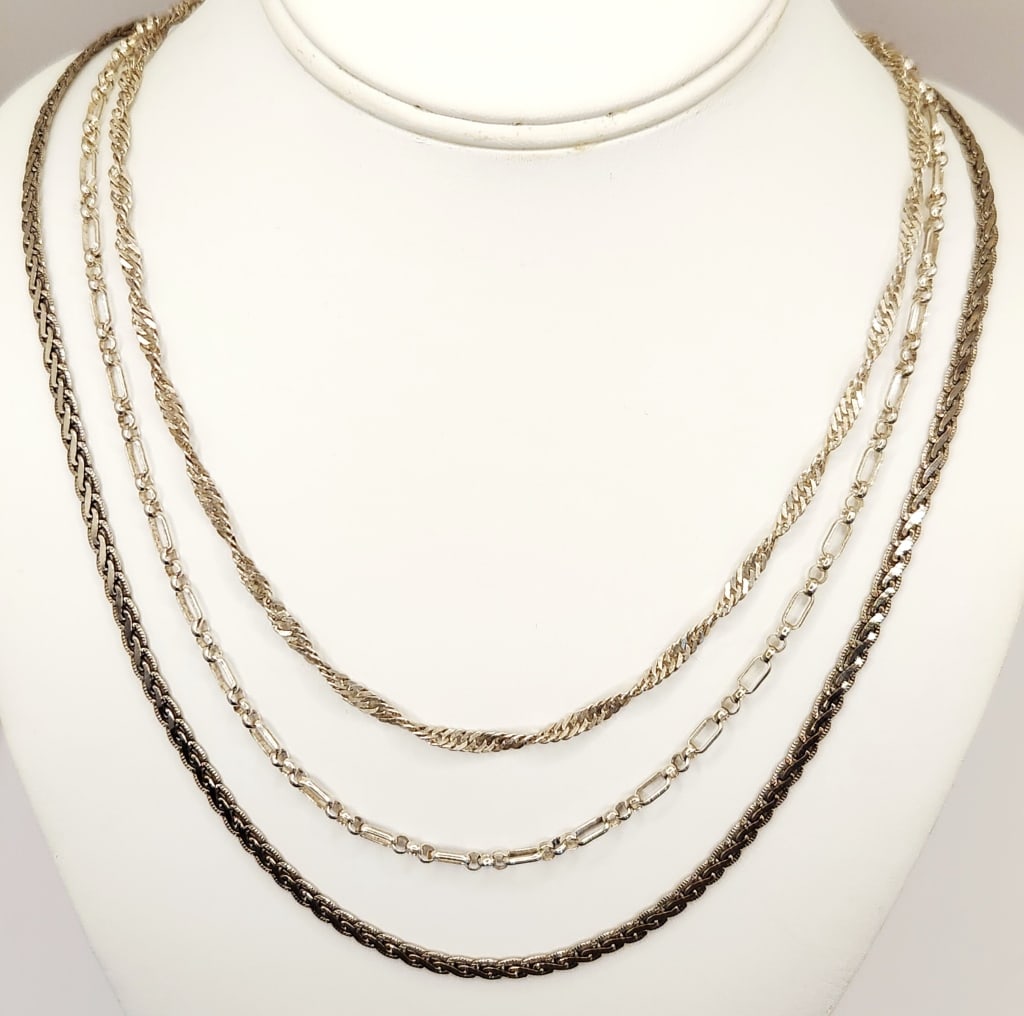 925 Sterling Chains 38.2 Grams: Necklaces as shown are 24" & 18". Weighs 38.2 grams.
