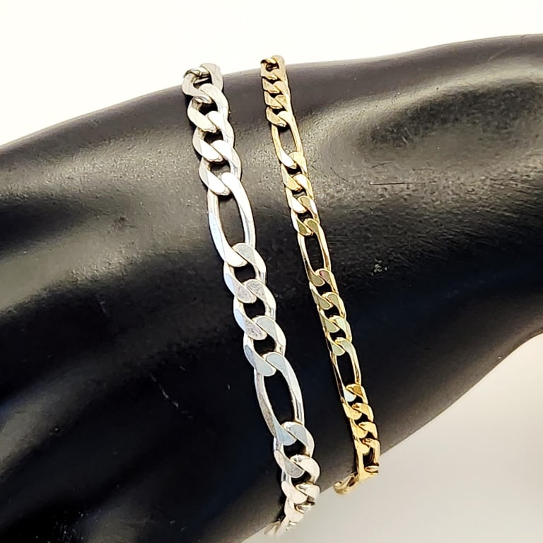 925 Vermeil & 925 Sterling Bracelets 12.3 Grams: Link Bracelets Vermeil bracelet is 7".Sterling bracelet is 8".Lot weighs 12.3 grams.