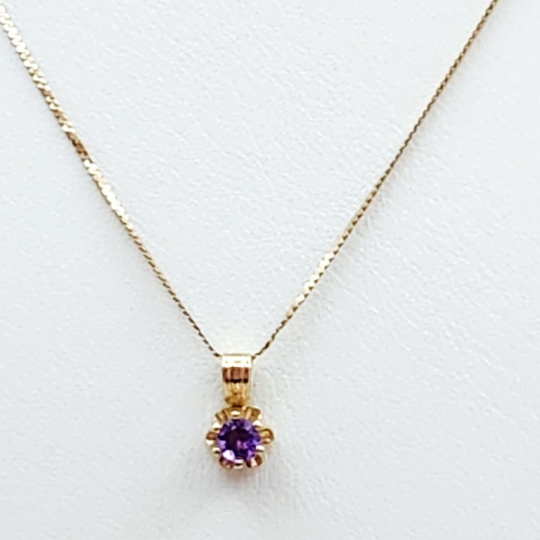 14K Gold Amethyst Necklace 1.0 Gram: Fine chain necklace is 15".Pendant is marked 14K inside the bail.