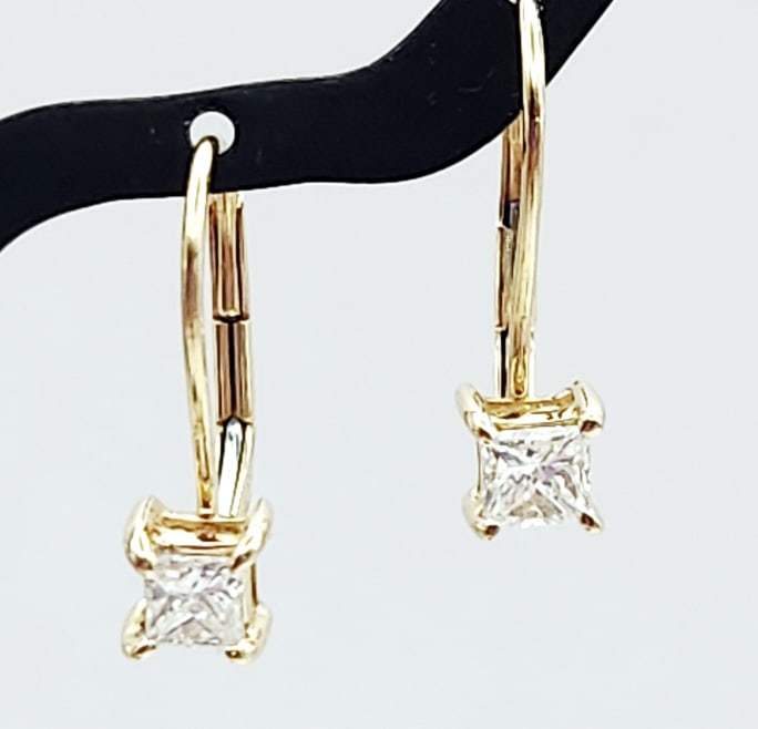 14K Gold Diamond Earrings 1.2 Grams: Princess cut diamonds.