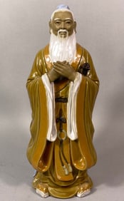 A Chinese Dehua Glazed Ceramic Figure of a Sage