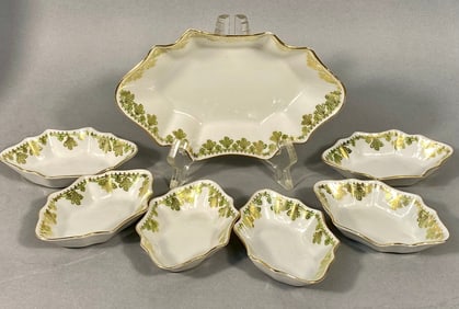A Set of Seven Imperial Crown China Austria Porcelain Shell-Form Dishes with Green and Gold Foliage