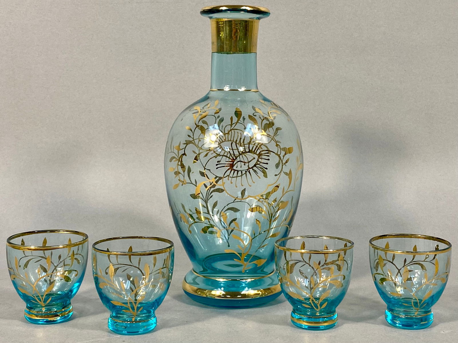 A Mid-Century Venetian-Style Blue and Gold Gilt Glass Cordial Set, comprising a Decanter and Four (1 of 5)