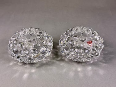 A Pair of Orrefors Sweden 'Raspberry' Crystal Candle Holders