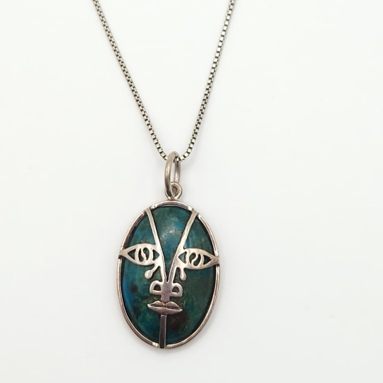 925 Sterling Chrysocolla Pendant 9.6 Grams: Necklace is 18" Chain is marked 925. Sterling wrap on pendant acid tested sterling. Pendant is signed, 1st name is Teller, 2nd name is illegible.