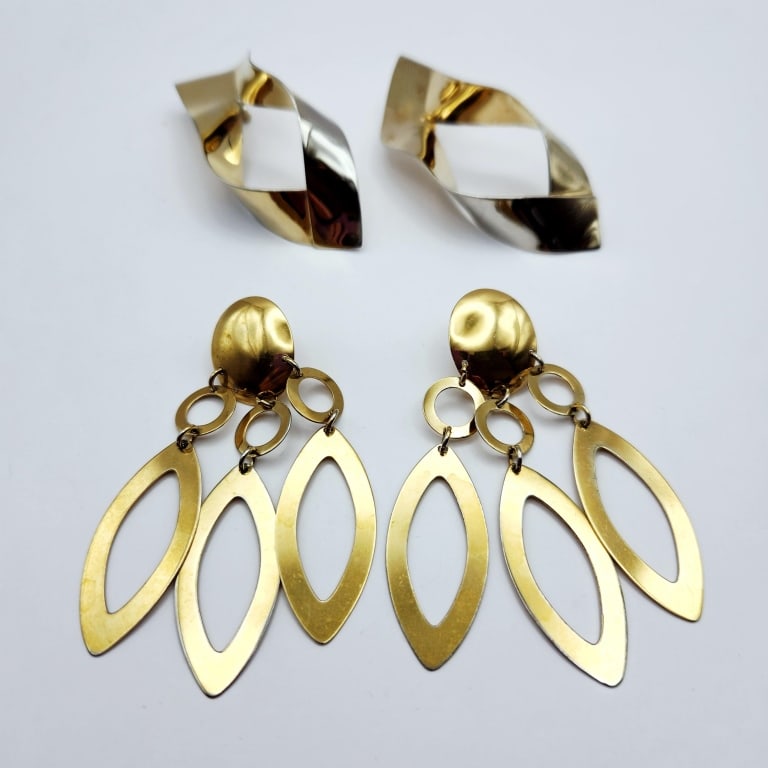 Vermeil Earrings 43.8 Grams: Drop gold over sterling & geometric pierced earrings.Some of the gold is worn on the geometric earrings.Lot 43.8 grams.
