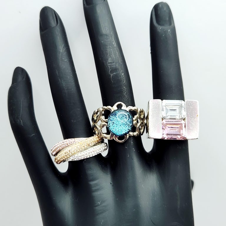 Gemstone & Crystals Sterling Rings 25.2 Grams: The rings with crystals is marked 925.The other rings acid tested sterling.