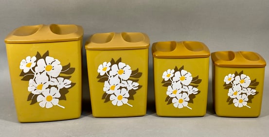 A Set of Four Vintage Mid-Century Modern Plastic Nesting Kitchen Canisters, Avocado Green with