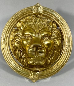 A Large Polished Brass Lion Head Door Knocker