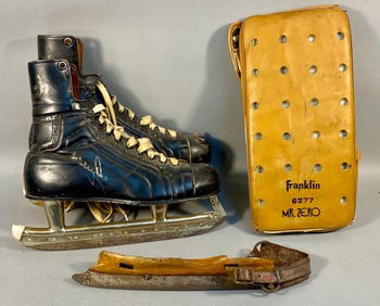 A Collection of Three Ice Skating Artifacts, including a Pair of Bobby Orr Signed Rally Ice Hockey