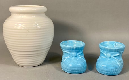 A Haeger Off-White Ribbed Art Pottery Vase, dated 1996, and a Pair of Haeger 'Gardenhouse' Baby