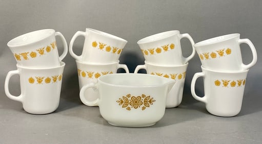 A Collection of Pyrex Butterfly Gold Mugs and Gravy Boat