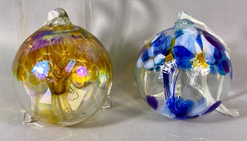 A Pair of Rogi Glassworks Blown Glass 'Witch Balls' with Tree of Life Motif, circa 1990