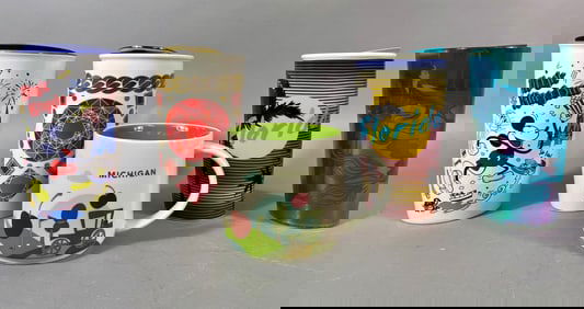 A Collection of Five Starbucks Beverage Containers, including a Michigan 'You Are Here' Collection