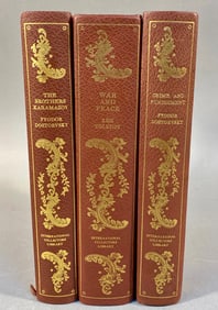 Three Volumes from the International Collectors Library: *The Brothers Karamazov*, *War and Peace*,
