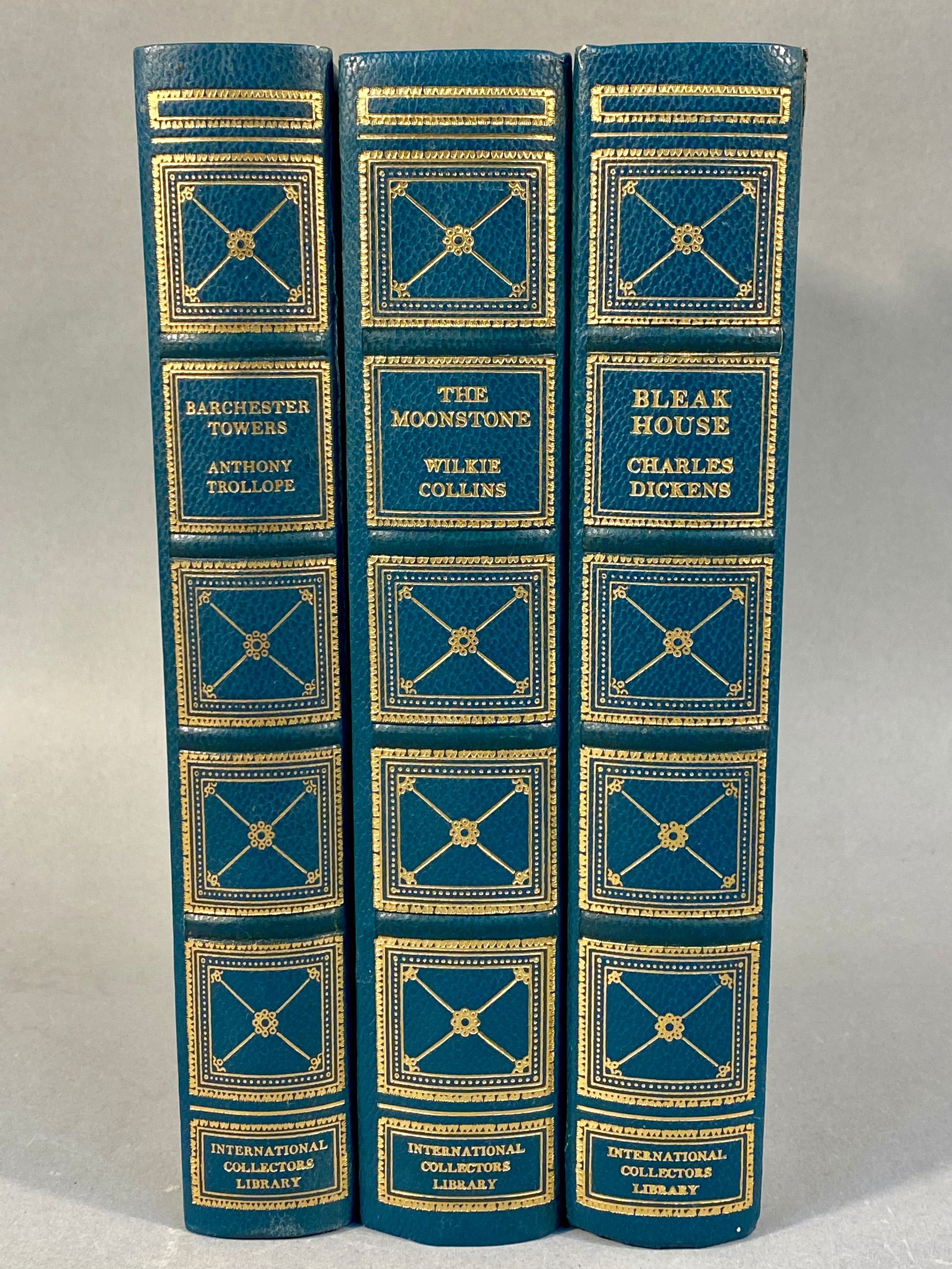 Three International Collectors Library Books: Barchester Towers, The Moonstone, and Bleak House: A group of three mid-20th century hardcover books from the International Collectors Library series, published by Doubleday & Company, Inc. and printed in the USA. The lot includes "Barchester