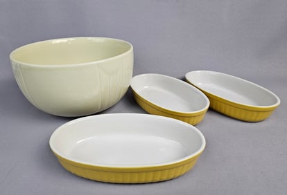 A Group of Four Glazed Stoneware Culinary Items, including Three Cerutti Oval Baking Dishes