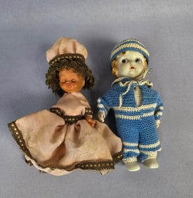 A Pair of Vintage Kewpie-Type Dolls, one Bisque and one Hard Plastic