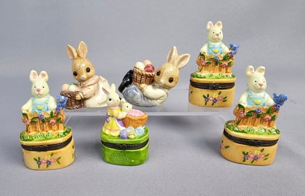 A Group of Six Glazed Ceramic Easter Rabbit Figurines and Trinket Boxes