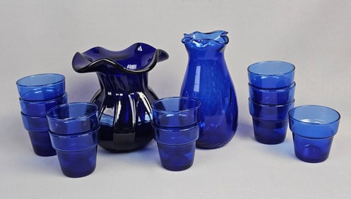 A Collection of Blue Glass Comprising Two Hand-Blown Vases and Eleven Anchor Hocking Candle Holders