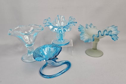 A Group of Four Blue Glass Compotes and Decorative Objects