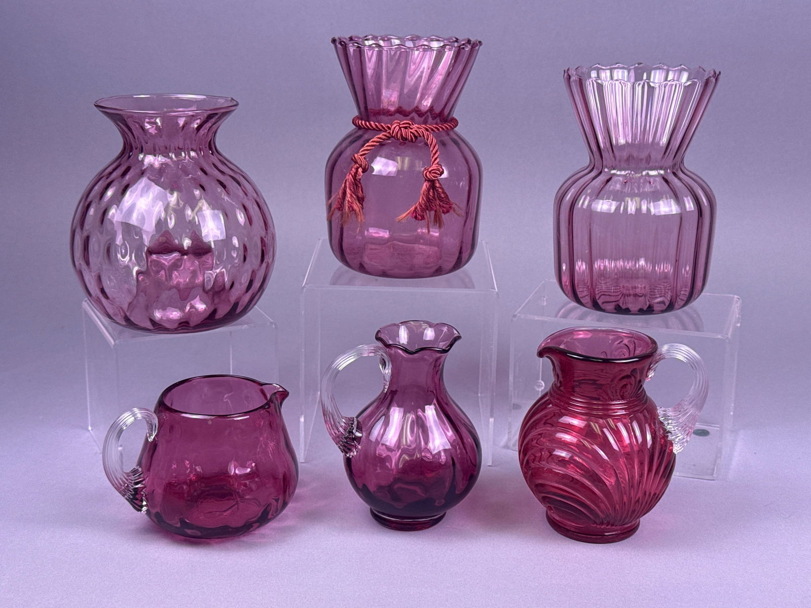 A Collection of Six Pilgrim Cranberry Glass Vessels (1 of 4)