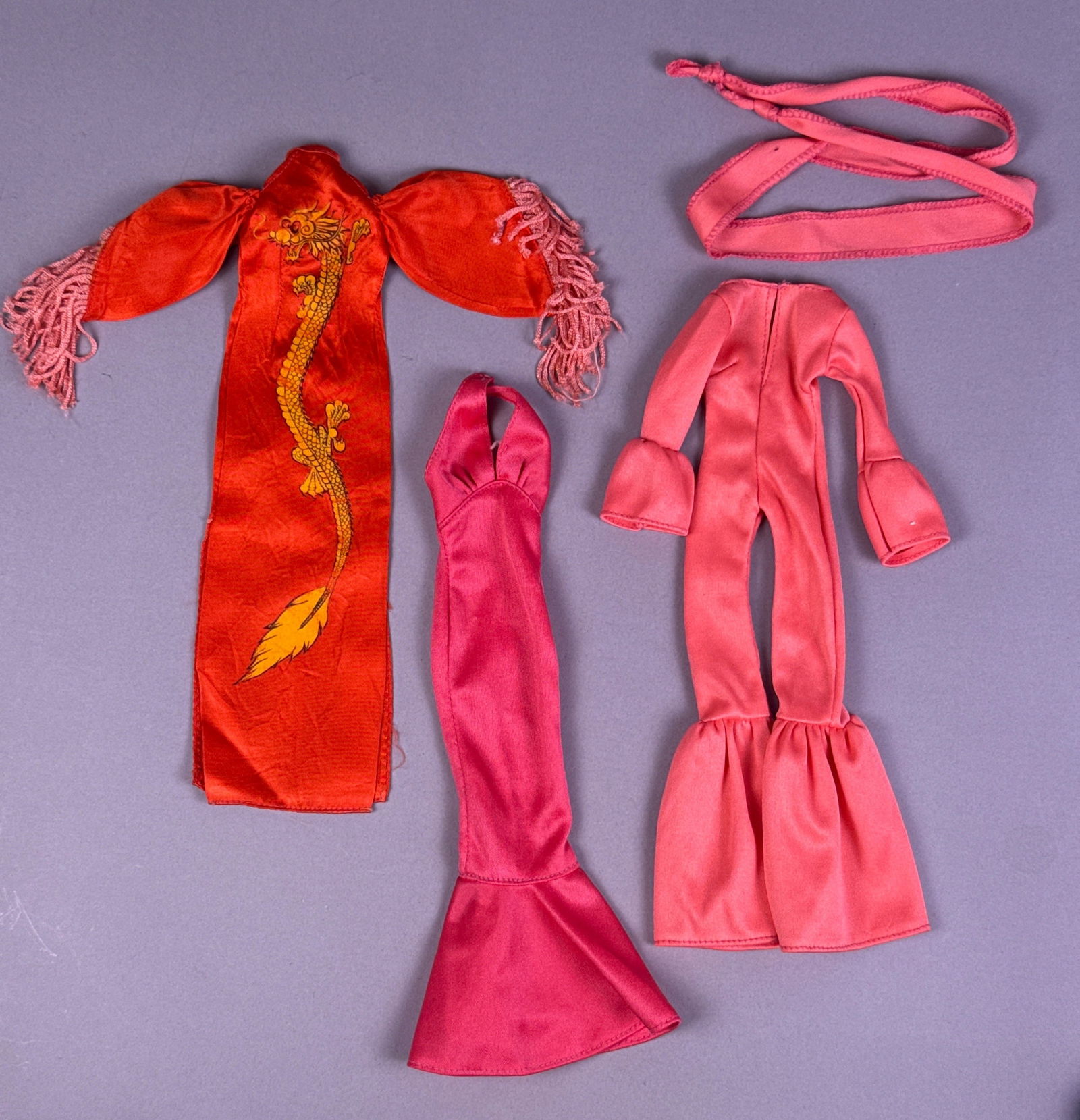 A Collection of Mego Cher Doll Clothes by Bob Mackie, including Dragon Robe (1 of 9)