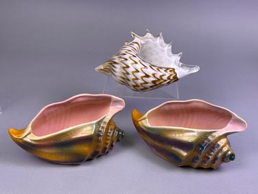 Three Decorative Shell Vessels, Including a Murano Style Art Glass Conch Shell and a Pair of Ceramic