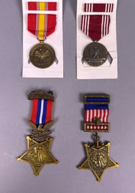 A Group of Four U.S. Military Medals, including two Civil War Medals of Honor