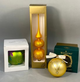 Three Modern Glass Christmas Ornaments, including Waterford and Polish Examples