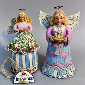 A Pair of Jim Shore Heartwood Creek Angel Figurines: 'Stitch And Sew 'Til You're Aglow' and 'Love