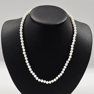 14K Yellow Gold Natural Pearl Necklace: Necklace measures 18 inches