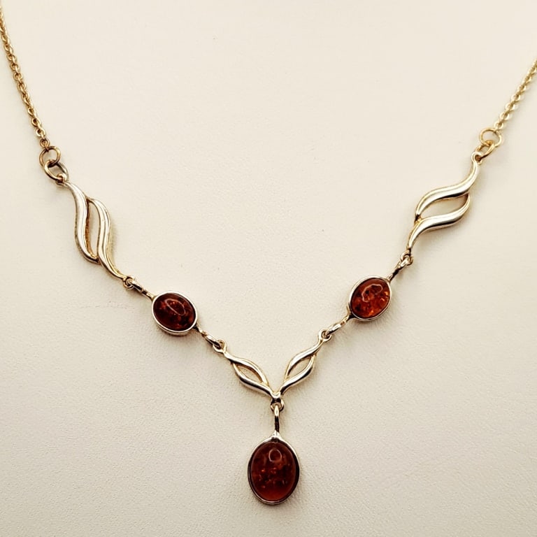 Sterling Baltic Amber Necklace 8.1 Grams: Necklace is 18"Both necklace and pendant are marked 925.