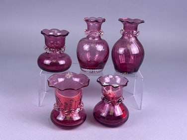A Set of Pilgrim Glass Cranberry Swirl Bud Vases