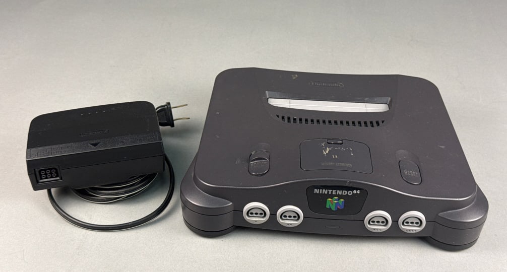 A Nintendo 64 Video Game Console and Power Adapter (1 of 7)