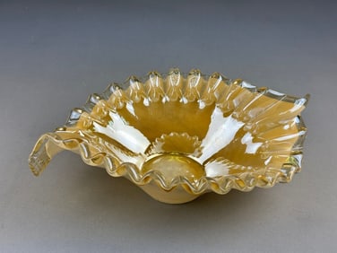 An Iridescent Amber Cased Art Glass Ruffled Bowl