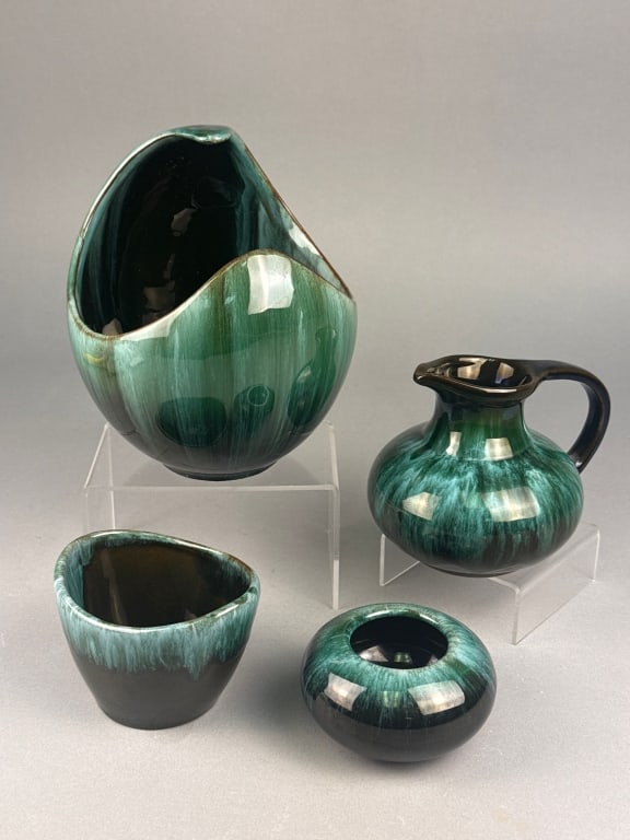 A Group of Four Blue Mountain Pottery Mid-Century: A group of four Mid-Century Modern ceramic vessels by Blue Mountain Pottery, Canada. Each piece features the characteristic high-gloss, flowing drip glaze in vibrant shades of teal, turquoise, and dar