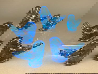 A Group of Terra Studios Blue Bird of Happiness Ar