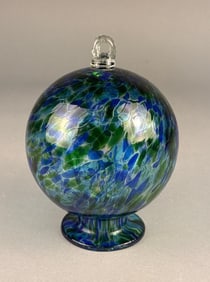 A Hand Blown Blue and Green Glass Friendship Ball