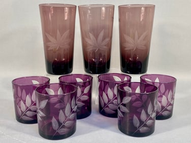 A Set of Nine Purple Etched Glass Tumblers, compri
