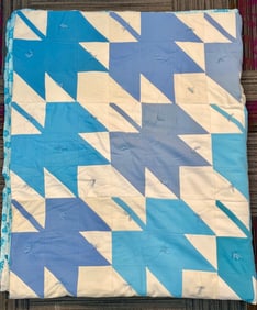 A Blue and Off-White Cotton Tied Patchwork Quilt w