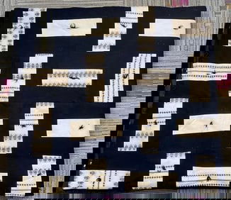 A Quilted Textile with Dark Blue-Black and Cream G