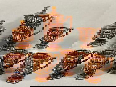 A Seven-Piece Mid-20th Century Brown Glazed Cerami