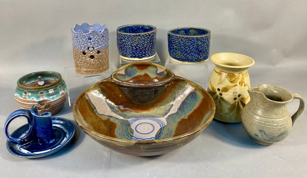 A Collection of Eight Contemporary Studio Pottery: A collection of eight contemporary studio pottery ceramic items, primarily fashioned from stoneware with varied glazes and decorative approaches. The group includes a large, multi-section chip and dip