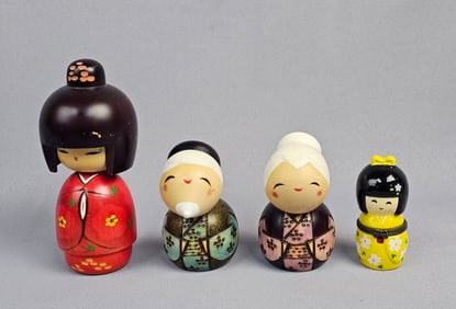 A Collection of Japanese Kokeshi Dolls and a Trink