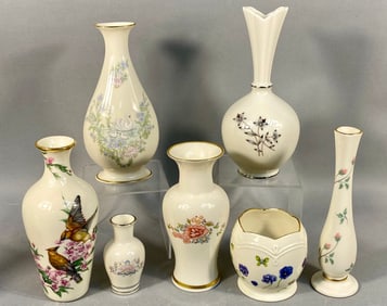 A Collection of Seven Lenox Floral and Figural Vas