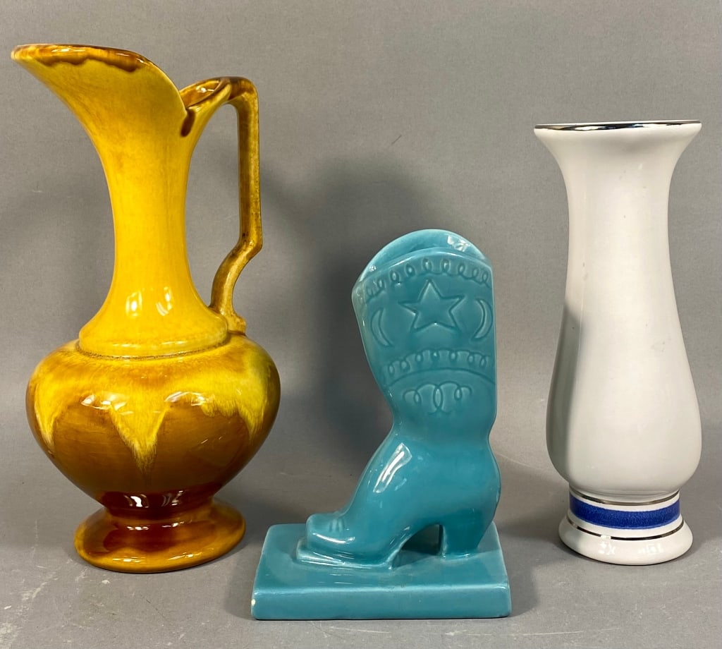 A Collection of Three Haeger Ceramic Decorative Ob: A Royal Haeger Gold and Brown Drip Glaze Pitcher Ewer, accompanied by two other Haeger ceramic decorative objects, all consistent with mid-20th century styles. The pitcher, marked "Haeger" on its unde