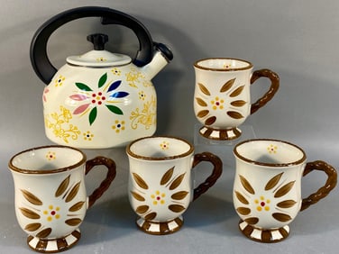 A Five-Piece Modern Temp-tations Kitchenware Set,